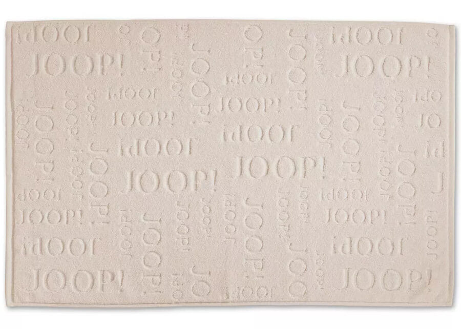Badvorleger aus Baumwolle in Sand: Der moderne, saugfähige und pflegeleichte Badvorleger "Joop Repeat" in Sand ist ein stilvolles Badaccessoire.