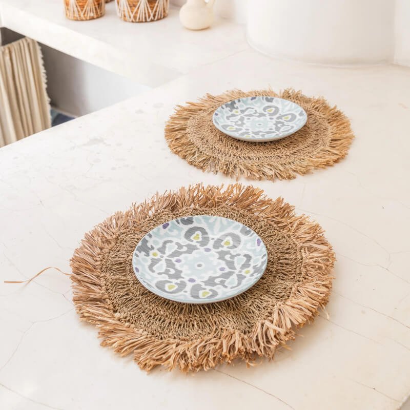 Platzsets "Waisai" mit Fransen: Die runden Boho-Platzsets sind ausgefallene Tischsets.