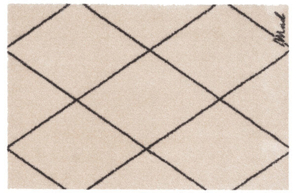 Beige Badezimmermatte, modern gemustert und rutschfest.