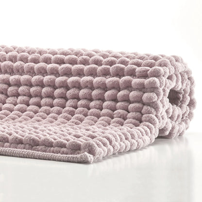 Badezimmerteppich in Rosa (Dusty Pink): Der ausgefallene und weiche Badteppich "Axel" von Aquanova ist ein hochwertiges Badaccessoire.