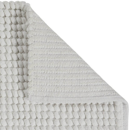 Aquanova Badteppich Axel in Salt Offwhite – weicher Badezimmerteppich in hellem Offwhite-Ton für ein modernes und stilvolles Badezimmer.