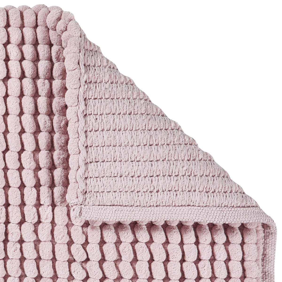 Detailansicht der rutschfesten, latexierten Unterseite des Aquanova Badteppichs Axel in Altrosa Dusty Pink für sicheren Halt im Badezimmer.