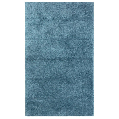 Badezimmerteppich Ray Ocean mit breiten, markanten Hoch-Tief-Streifen in Meeresfarben und rutschfester Unterseite.