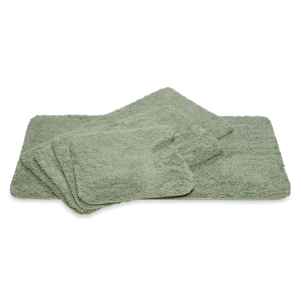 Weicher Badteppich Ranger in Smoke Green Rauchgrün von Vandyck mit Schlingenoptik und rutschfester Unterseite für ein modernes Badezimmer.
