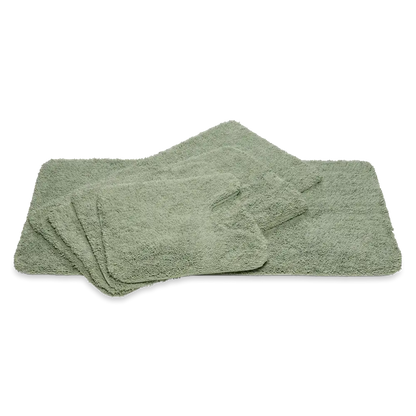 Weicher Badteppich Ranger in Smoke Green Rauchgrün von Vandyck mit Schlingenoptik und rutschfester Unterseite für ein modernes Badezimmer.