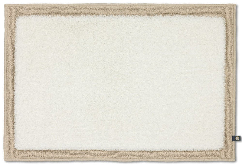 Badezimmerteppich Maß Frame von Rhomtuft in Ecru-Creme, individueller Teppich für ein stilvolles Bad.