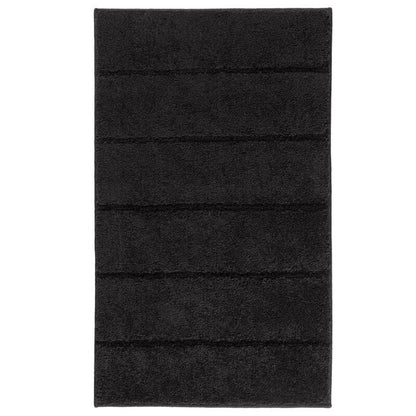Badteppich Ray Schwarz mit markanten, breiten Hoch-Tief-Streifen und rutschfester Unterseite.