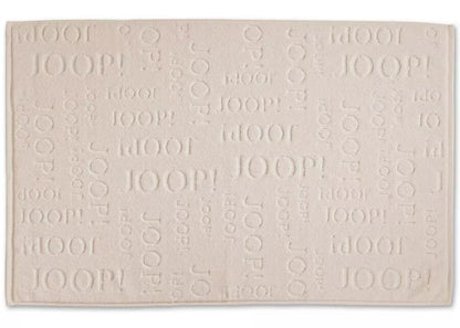 Badvorleger aus Baumwolle in Sand: Der moderne, saugfähige und pflegeleichte Badvorleger "Joop Repeat" in Sand ist ein stilvolles Badaccessoire.