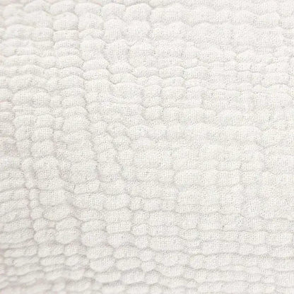 Baumwollplaid Puglia in Offwhite mit Crinkle-Optik – weiche und stilvolle Wohndecke für ein gemütliches Zuhause.