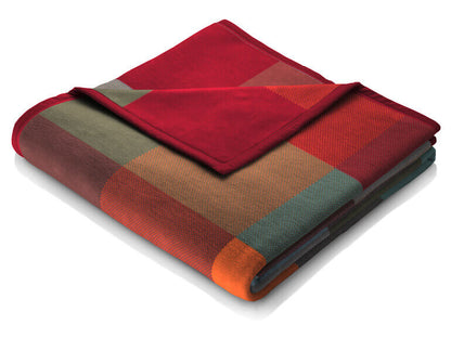 Farbenfrohe, karierte Couchdecke Color Woven für lebendige Akzente.