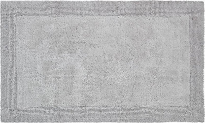 Kuschelige Füße: Der flauschige Bio-Badezimmerteppich "Luxor Grund" in der Farbe "Kiesel Grau" ist ein Wohlfühlerlebnis für Ihre Füße.