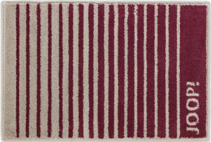 Fluschiger Badteppich "Shutter" von Joop: Der pflegeleichte und hochwertige Badezimmerteppich in Rouge ist ein stilvoller Teppich.