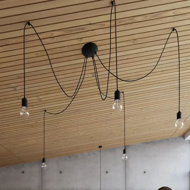 Schwarze moderne Pendelleuchte mit variabler Deckenmontage und freihängenden Kabeln – Design Hängelampe