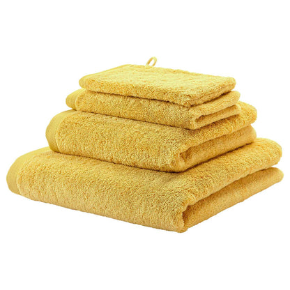 Handtuch-Set London in Mimosa Gelb von Aquanova – weiche Gäste- und Duschtücher aus Baumwolle für ein modernes Badezimmer.