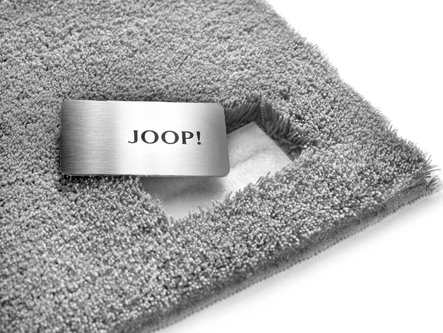 Badezimmerteppich "Luxury" von Joop: Luxuriöse Weichheit für Ihr Badezimmer – dieser schnell trocknende Badezimmerteppich von Joop mit edlem Edelstahl-Logo ist ein echtes Highlight.