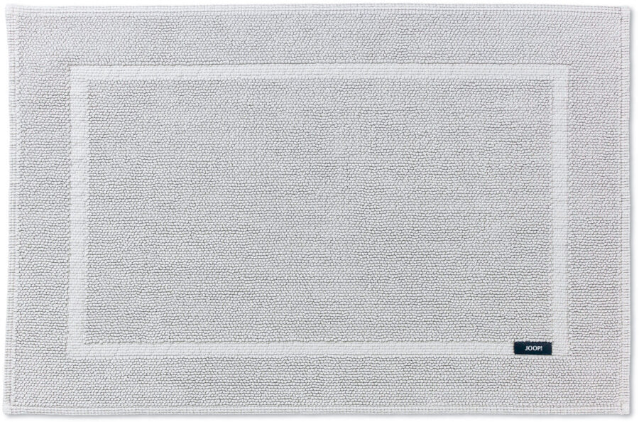 Edle Details: Der "Joop!" Badteppich/Vorleger "Pearl" aus Baumwolle in der Farbe "Silber" bringt edle Details in Ihr Badezimmer.