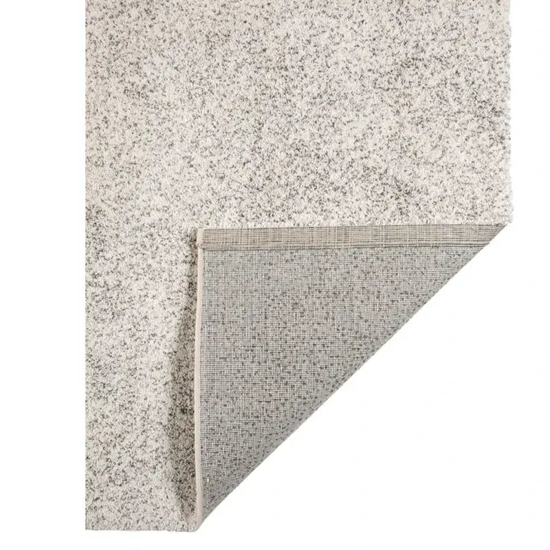 Teppich Abu in Grau-Creme mit weicher Struktur und zeitgemäßem Design.