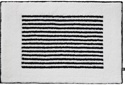 Moderner Badteppich Linea in Weiß Schwarz als Maßanfertigung – stilvoll und individuell für ein zeitgemäßes Badezimmer.
