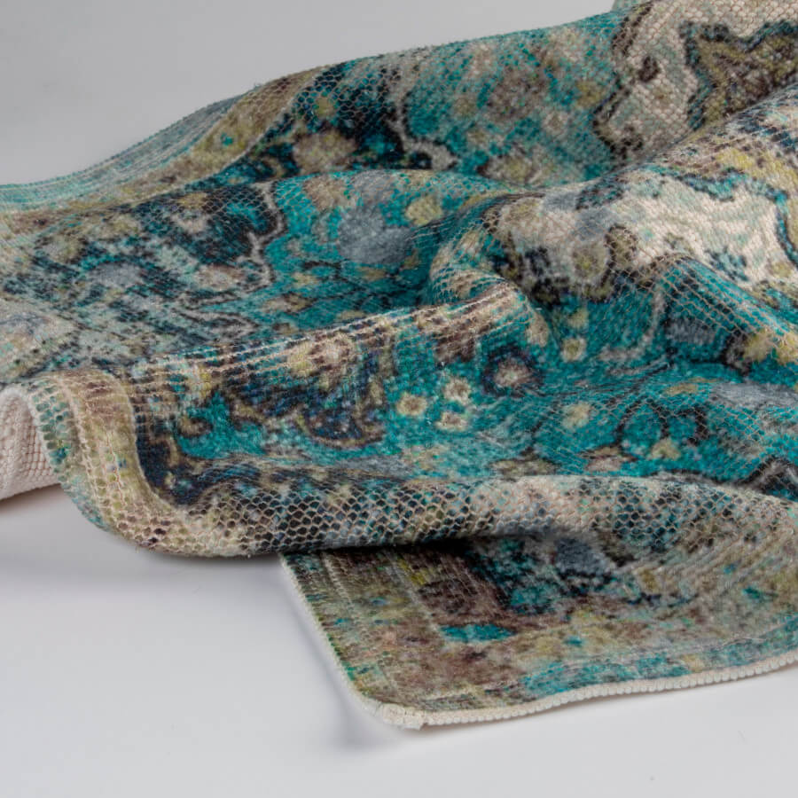 Evelyn Kahle Persia Vintage-Teppich, Oliv: Gemusterter Teppich mit Used-Look für den Flur.
