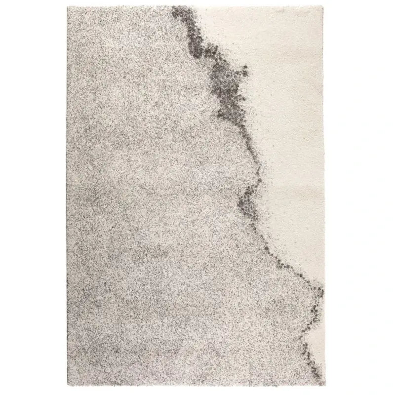Moderner Teppich Abu mit weichem Kurzflor und trendigem, abstraktem Muster.
