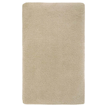 Flauschiger Badteppich Mauro in Almond Mandelbeige von Aquanova – rutschfester und weicher Badezimmerteppich für eine warme und natürliche Badgestaltung.