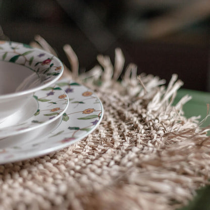 Tischset "Ambon Soeji" im Boho-Stil: Das runde Platzset mit Fransen im Ibiza-Stil ist ein stilvolles Tischset.