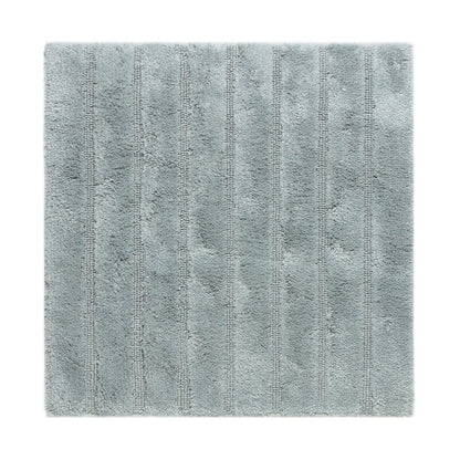 Quadratischer Badematte in frischem Seagreen, speziell als WC-Vorleger, rutschfest und mit Hoch-Tief-Struktur.