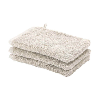 Hochwertiges Baumwoll-Waschhandschuh-Set von Aquanova London (Jasmin) für sanfte Reinigung.