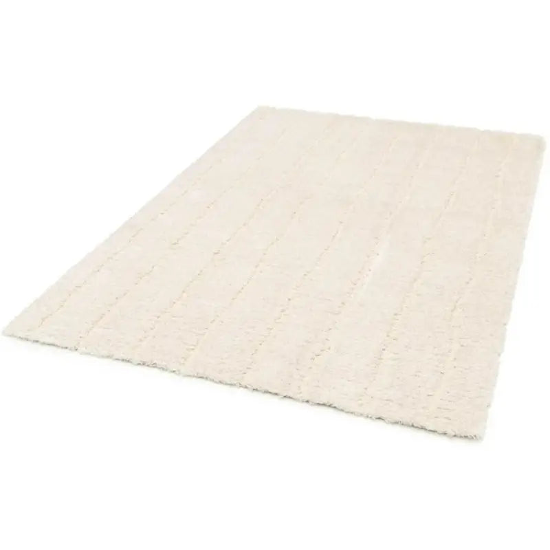Teppich Maël in Creme mit weicher Hochtief-Struktur und dezenten Linien – moderner Wohnteppich